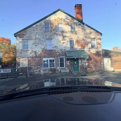 Old Winterport Commerical House Llc - View of parking lot before checking in for an overnight that I booked online