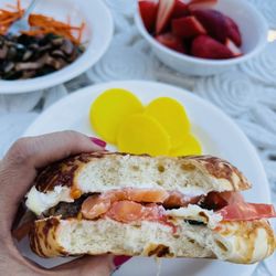 Pavilions - Salmon sashimi whipped cream cheese bagel with heirloom tomato, sautéed veggies, pickled radish, fresh strawberries