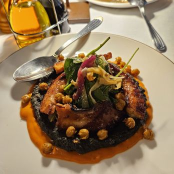 Unico Restaurante - Octopus with black hummus. - Italian Near Me - Chicago, Illinois Unico Restaurante - Octopus with black hummus. - Italian Near Me - Chicago, Illinois