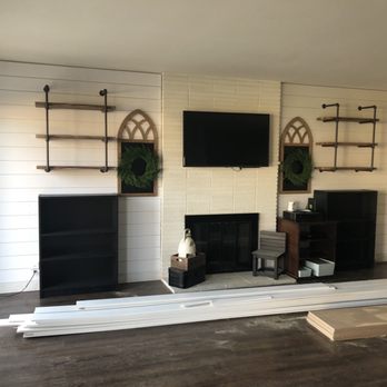 Trusty Justin - Living room with shiplap new shelves and bookcases. Justin did a wonderful job installing everything! - Handyman Near Me - Orange, California
