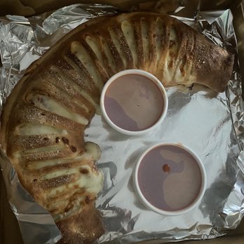 Zuccarelli - Large meat lovers Stromboli - Pizza Near Me - Pompano Beach, Florida Zuccarelli - Large meat lovers Stromboli - Pizza Near Me - Pompano Beach, Florida
