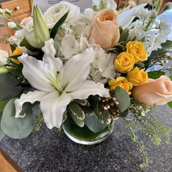 The Flower Shoppe of Eric's - designers choice $75 low lush with lilies as requested