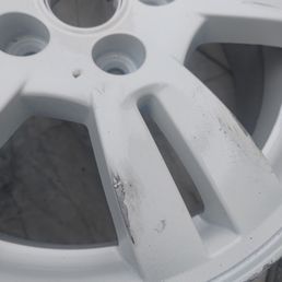 Mark on wheel after asking politely that they be careful with them, they are only ok for "light handling".