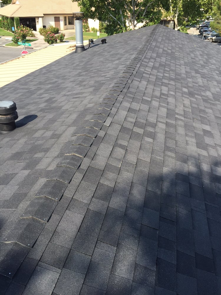 Slide of The Roof Repair Guy