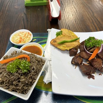 La Belle Jacmelienne Cafe - Fried Turkey with black rice,fried plantains and.You have the option to sub the plantains for mac n cheese and pikliz is included. - Haitian Near Me - Miramar, Florida