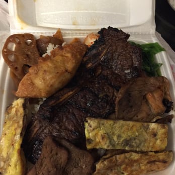 Family BBQ - House special. Noodles hiding below with the rice - Korean Near Me - Honolulu, Hawaii