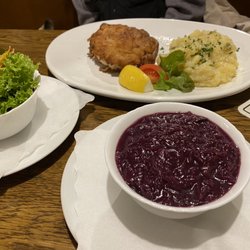 Tambosi - Cordon Bleu, potato salad, side salad, and red cabbage