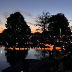 Water Lanterns on the lake at dusk.