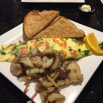 Keke's Breakfast Cafe - Greek omelet with potatoes and wheat toast - Breakfast & Brunch Near Me - Winter Park, Florida Keke's Breakfast Cafe - Greek omelet with potatoes and wheat toast - Breakfast & Brunch Near Me - Winter Park, Florida