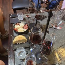 Dog Gone Wine Bar - Red wine flight, charcuterie, and bread
