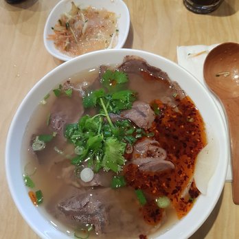 GB Hand-pulled Noodles - Lanzhou beef noodle soup. Thick slices of lean beef and topped with cilantro, green onion and chili oil (I said to out just a bit) - Chinese Near Me - Toronto, Ontario GB Hand-pulled Noodles - Lanzhou beef noodle soup. Thick slices of lean beef and topped with cilantro, green onion and chili oil (I said to out just a bit) - Chinese Near Me - Toronto, Ontario