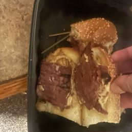Pastrami in a hoagie roll. Looks microscopic between the buns.