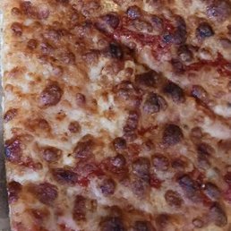Very dry, too much cheese, overcooked Pizza, hard to chew, let alone swallow, cardboard looking pizza.