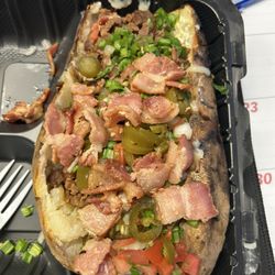 Carnicera La Picana - Huge Asada Potato. I asked for sour cream on the side.