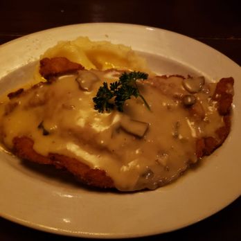 The Bavarian Lodge - Hunter's schnitzel with mashed potatoes - German Near Me - Lisle, Illinois The Bavarian Lodge - Hunter's schnitzel with mashed potatoes - German Near Me - Lisle, Illinois