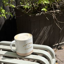 Great coffee in their cute yard!