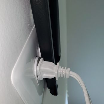 The Big Screen Store - Mount over outlet & extension cord that the so called "professionals" plugged my equipment in. - Electronics Near Me - Glen Burnie, Maryland