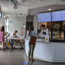 Cafe Aloe counter with @Sonrisa doughnut pop-up being set up
