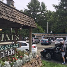 This is the sign out front of Fini's drive up restaurant.