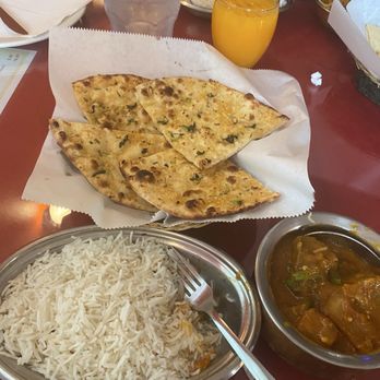 Dinner India - Lamb vindaloo, garlic naan, mango juice. - Indian Near Me - Pensacola, Florida