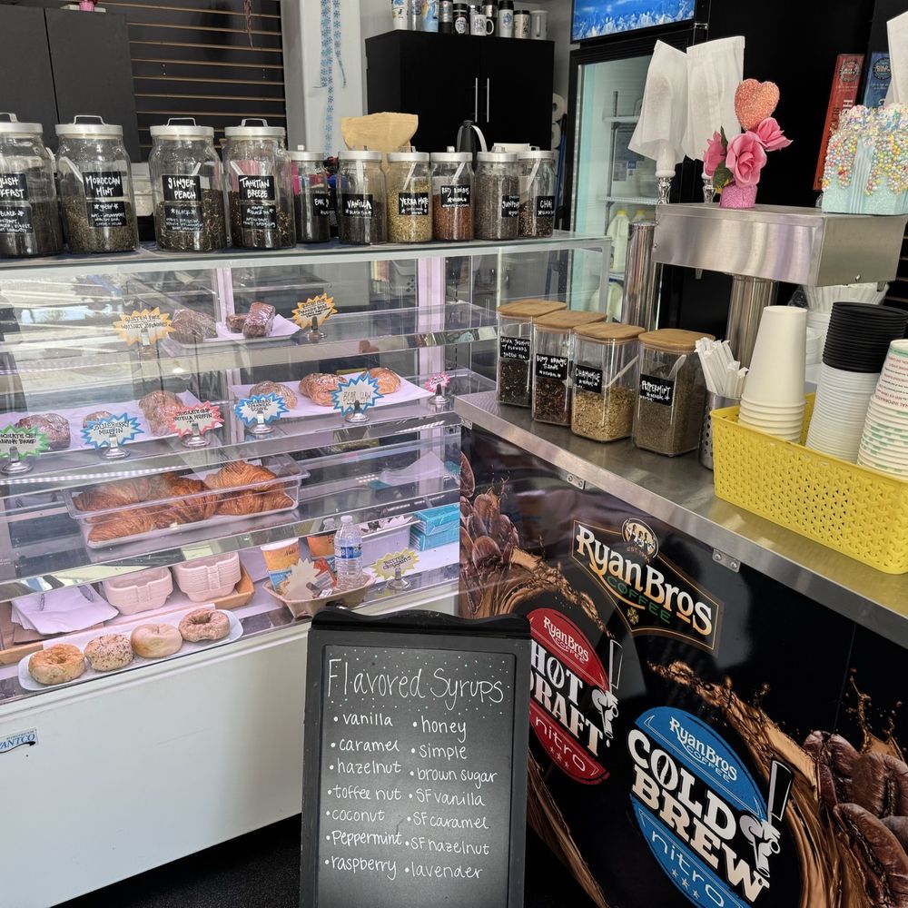 Crown Point Coffee - Pastry case with looseleaf tea, selection, and Ryan Brothers coffee bar. A couple of the coffees were out on the tap. - Coffee & Tea Near Me - San Diego, California