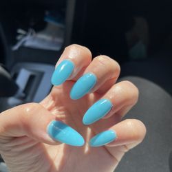 Deluxe Nail Salon & Spa - Turquoise almond shaped nails