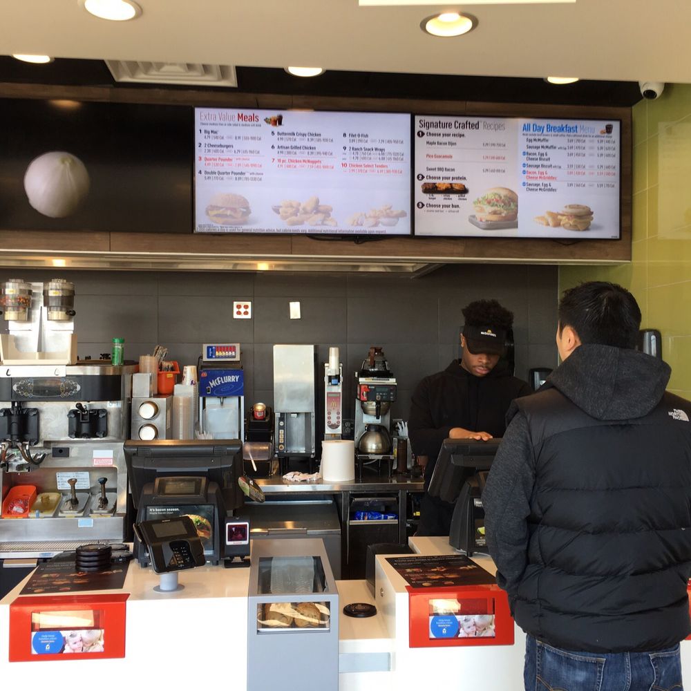 McDonald's - a man ordering food at a counter - Burgers Near Me - Green Brook, New Jersey McDonald's - a man ordering food at a counter - Burgers Near Me - Green Brook, New Jersey