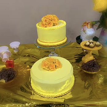Tutto Cream - a table with a cake and cupcakes - Desserts Near Me - Ossining, New York Tutto Cream - a table with a cake and cupcakes - Desserts Near Me - Ossining, New York