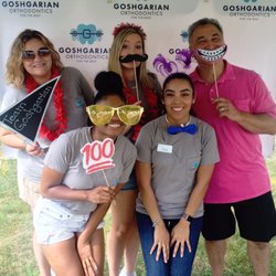 Goshgarian Orthodontics - The team having some fun in our photo booth at Gurnee Days 2016