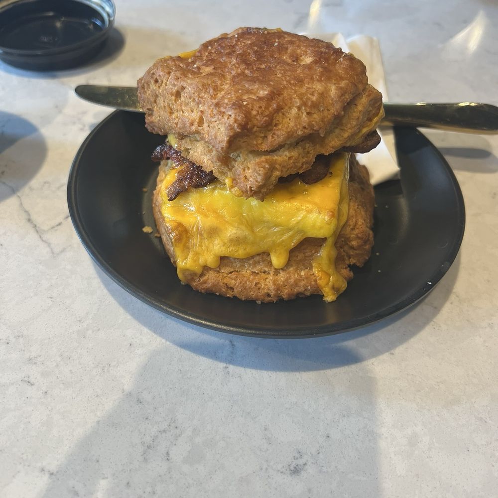 Hexe Coffee - Egg and cheddar sandwich on a biscuit. Really good and filling. - Coffee & Tea Near Me - Chicago, Illinois Hexe Coffee - Egg and cheddar sandwich on a biscuit. Really good and filling. - Coffee & Tea Near Me - Chicago, Illinois