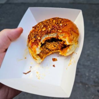 Manu's Dabeli Station - Garlic Dabeli. $7.99. Crunchy, spicy, aromatic, and very flavorful. Would recommend heavily if you can handle heat - Street Vendors Near Me - New York, New York Manu's Dabeli Station - Garlic Dabeli. $7.99. Crunchy, spicy, aromatic, and very flavorful. Would recommend heavily if you can handle heat - Street Vendors Near Me - New York, New York