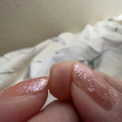 Speckled Nails & Spa - Example of how thin and bendy my nail became. :(