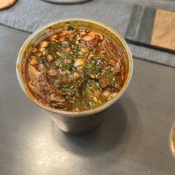 El Dicho Birrieria - a bowl of soup on a table - Mexican Near Me - Los Angeles, California El Dicho Birrieria - a bowl of soup on a table - Mexican Near Me - Los Angeles, California