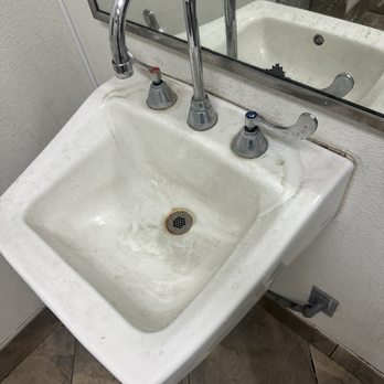 Ramona Tire - The sink is disgusting. At this point the toilet bowl looks cleaner than this. - Auto Repair Near Me - Palm Desert, California