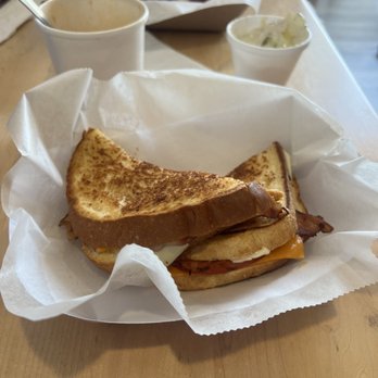 Miss Nikki’s Homemade - Three cheese, bacon, and tomato grilled sandwich. They buy their produce fresh and local. Excellent flavor. - Sandwiches Near Me - Osage Beach, Missouri Miss Nikki’s Homemade - Three cheese, bacon, and tomato grilled sandwich. They buy their produce fresh and local. Excellent flavor. - Sandwiches Near Me - Osage Beach, Missouri