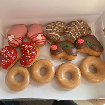 Krispy Kreme - Valentine doughnuts thrown into a box. - Donuts Near Me - Omaha, Nebraska Krispy Kreme - Valentine doughnuts thrown into a box. - Donuts Near Me - Omaha, Nebraska