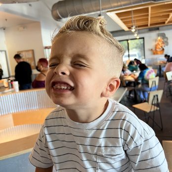 The Pride Barbershop - This is my son at lunch after his haircut - Barbers Near Me - Downey, California The Pride Barbershop - This is my son at lunch after his haircut - Barbers Near Me - Downey, California