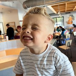 The Pride Barbershop - This is my son at lunch after his haircut
