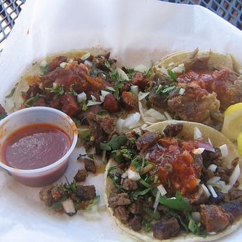 Taco Trucks - a taco with sauce and a lemon wedge - Food Stands Near Me - Los Angeles, California Taco Trucks - a taco with sauce and a lemon wedge - Food Stands Near Me - Los Angeles, California