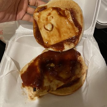 Best Burger - a person holding a sandwich in a styrofoam container - Burgers Near Me - Dallas, Texas Best Burger - a person holding a sandwich in a styrofoam container - Burgers Near Me - Dallas, Texas