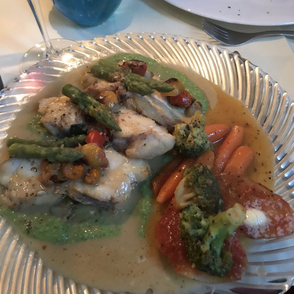Osteria Blu Notte - Fresh white fish with asparagus and green herb sauce - Italian Near Me - Munich, BY Osteria Blu Notte - Fresh white fish with asparagus and green herb sauce - Italian Near Me - Munich, BY