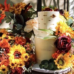 Double Bloom - Wedding flowers arranged on cake
