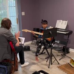 Giants Of Music - 8 year-old student learning Counting Stars by One Republic. He plays full chords!