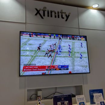 Xfinity Store by Comcast - Inside. Watching the Atlanta Falcons at Buffalo Bills game while I wait for my name to be called. - Internet Service Providers Near Me - Atlanta, Georgia