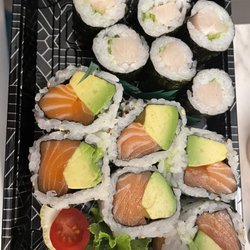 Sake Sushi - Hamachi roll and salmon avocado roll