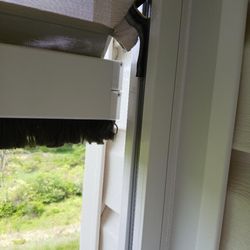 Best Window & Door - Out of the track ripped vertical awning by Best Window & Door.