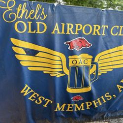 Ethel's Old Airport Club - Banner hanging in parking area