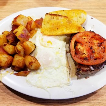 Eggs Up Grill - Monterey-style Sirloin Steak and Eggs Over Easy with Home Fries and Tuscan Toast. - Breakfast & Brunch Near Me - Rock Hill, South Carolina Eggs Up Grill - Monterey-style Sirloin Steak and Eggs Over Easy with Home Fries and Tuscan Toast. - Breakfast & Brunch Near Me - Rock Hill, South Carolina