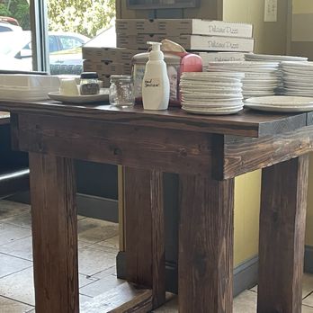 Forno Grill - Table with plates and to-go boxes - Italian Near Me - Knoxville, Tennessee Forno Grill - Table with plates and to-go boxes - Italian Near Me - Knoxville, Tennessee