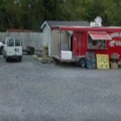 Smokin Pig BBQ - This is a Google pic so not the best but gives ya the gist of where shes located.
